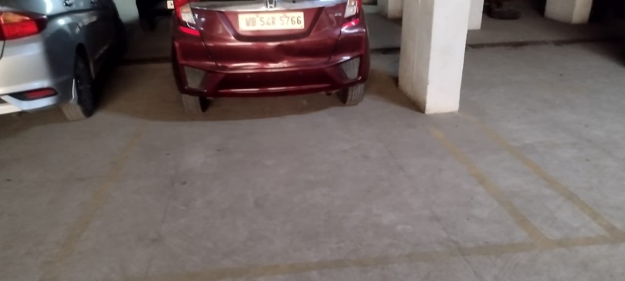 A car parked in my parking space